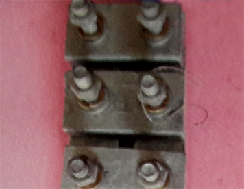 SPACERS, EARTH WIRE CLAMPS AND CORONA BELLS
